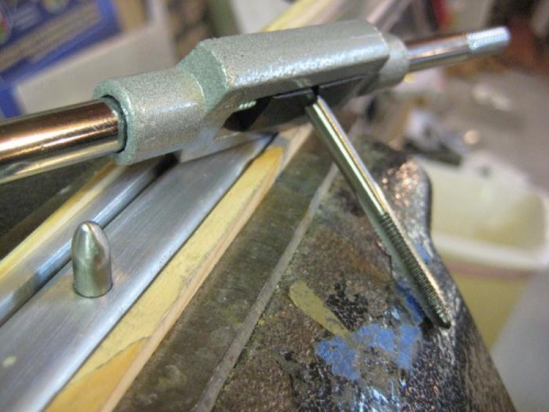 Pin after tapped and epoxyed in place.