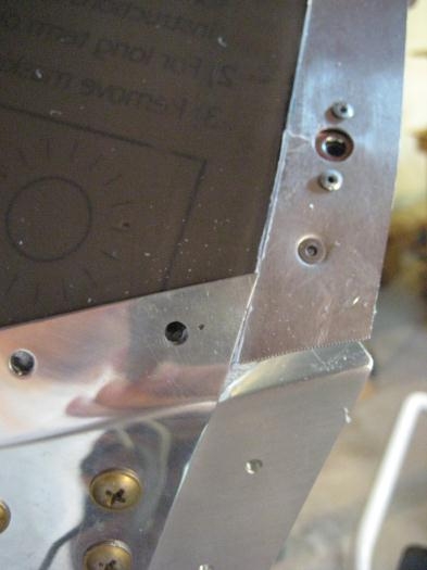 Windscreen at the forward corner, aligned with the fuselage side.