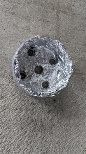 Restrictor with aluminum foil inside