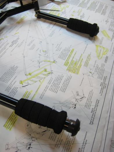 Far grip fully installed. Near grip with cap in place and set screw, ready to slide grip up.