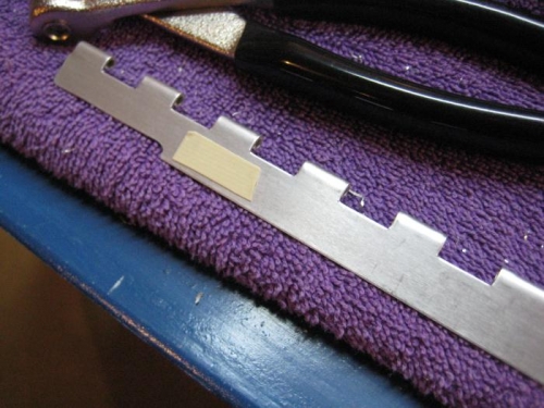 Double-sided carpet tape.