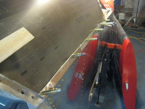 Windscreen cleco'd in place while trying to work with the bow strap.