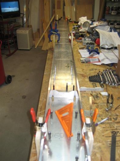 Looking down the spar with the 3 spacing jigs in use.