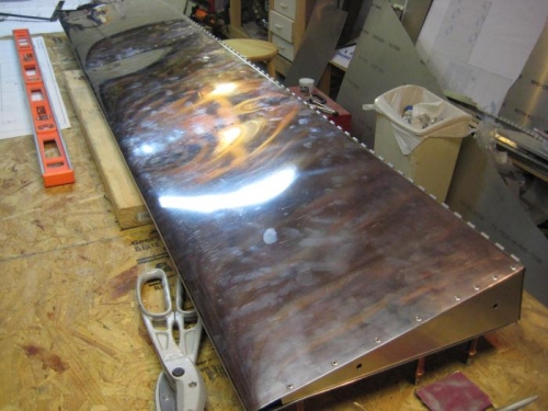 Lower surface riveted