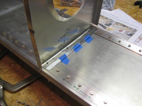 Tape is to hold spacers in place while locating the ribs.