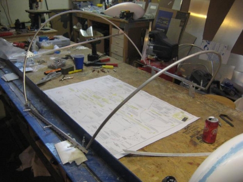 Canopy frame on the bench for updriling and riveting.