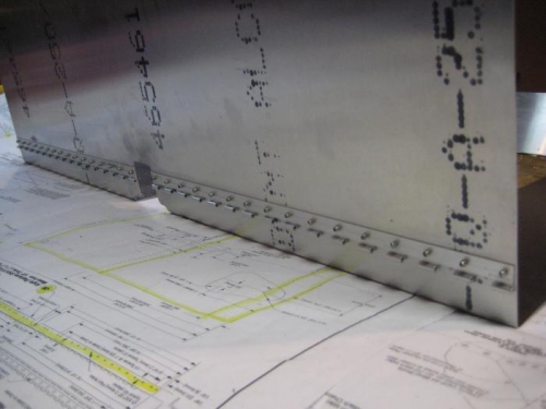 Hinge at back of seat