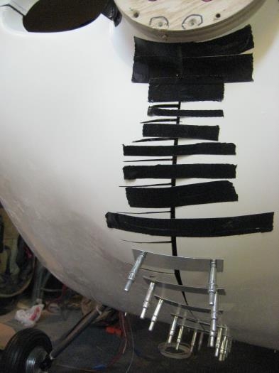 Horizontal cuts, duct tape and aluminum straps.