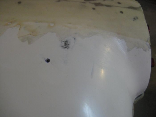 Pilot hole to verity location of filler below.