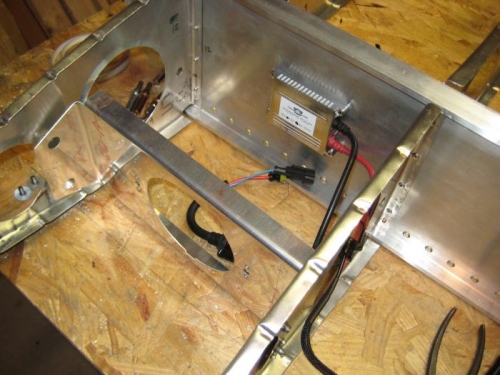 The Duckworks light bracket mostly in place. The box in back is the transformer for the HID light.