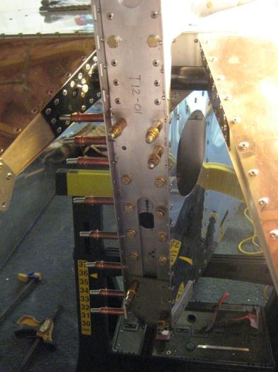 Tail post with bolts being loosely installed