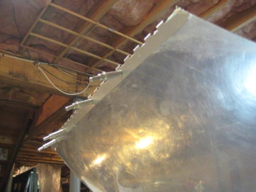 Pilot drilling for hinge strap at passenger side.