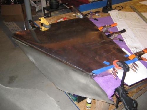 After clamping the trailing edge in place, the assembly flipped over for drilling
