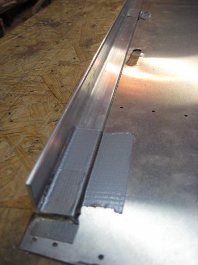 Lower longeron in place with double sided tape + duct tape