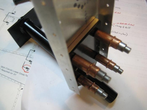 Drilled and cleco'd. You can see the spacer between the channel and the black plate of F23-01