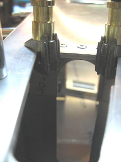 Shear web F22-03 viewed from aft to front. Spring clamps holding shear web against longerons.