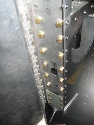 All the vertical tail post bolts secured in place.