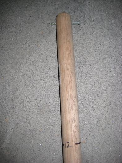 Screw at end of stick, with #12 rib mark shown.
