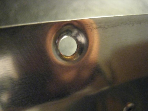 Fuselage skin dimpled for windscreen