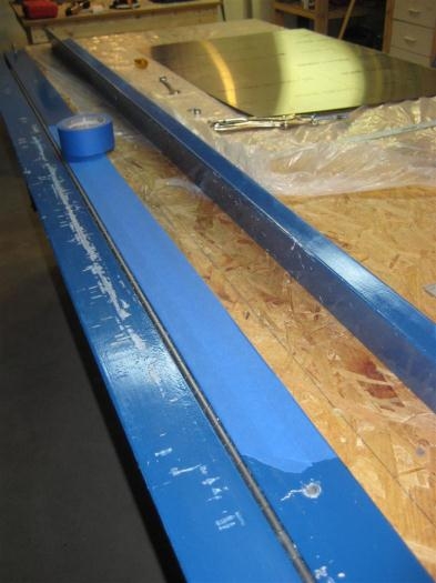 Putting painter's tape on all the metal surfaces that the skins will contact.