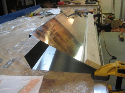 And finally using another piece of lumber, with my body weight, to bend it further still.