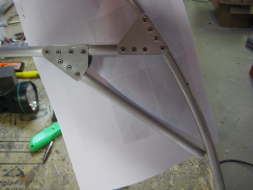 New brace and gusset riveted in place at one end.