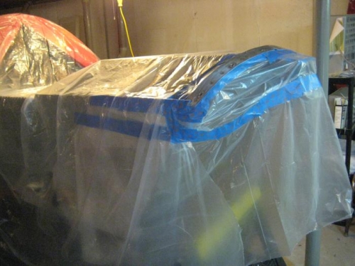 Fuselage masked, except for the cowl strap and back of the firewall