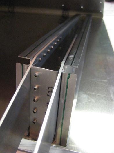 Guide lines down the ribs, to be seen through the holes in the skin.