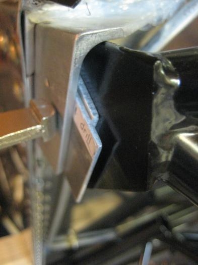 At the top, on this side, a .090 and .060 shim; on other side, one .090 shim.