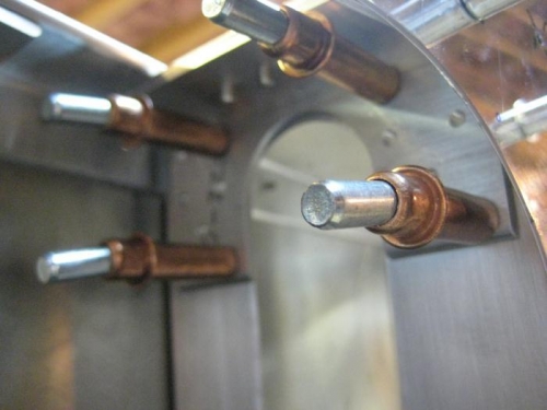 Shear web angle cleco'd to bulkhead F23-02.