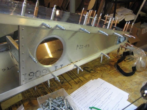 Fuselage on its side to access the shear web from underneath.