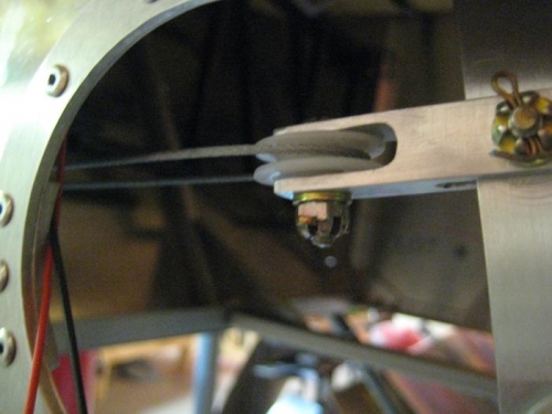 Cable seen around the brake handle pulley wheel.