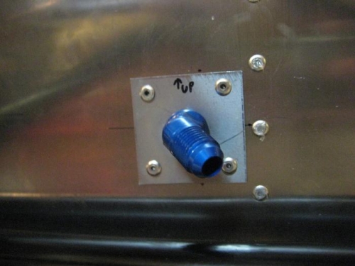 The 45 degree fuel fitting in place (engine-side of firewall)