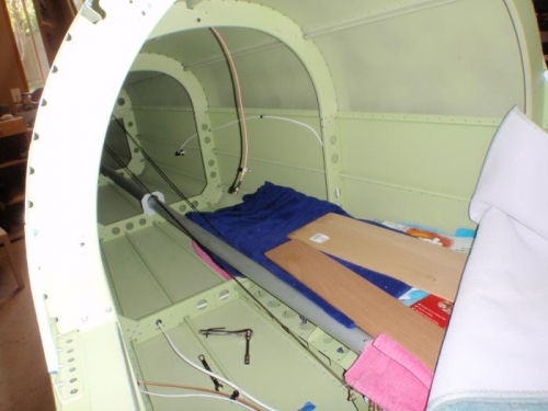 bed for laying in the aft fuselage