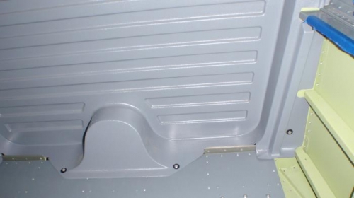 Rearbulkhead showing additional  2 screws,  tiedown plate and area where there are no screws.