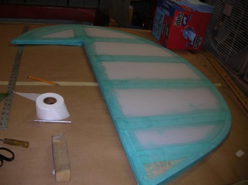 Rudder - with all tapes installed over areas that contact the fabric covering (beneath) and edges