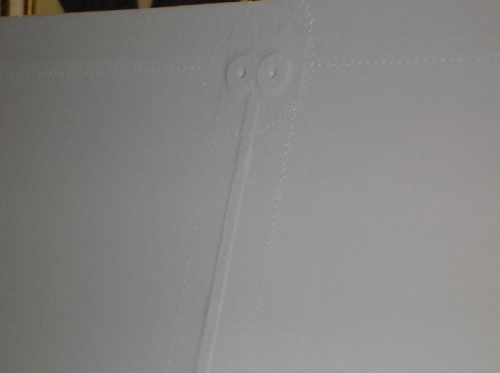 Rt lower Wing grommet shot in Eko Fill
