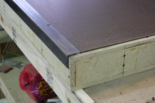 Angle drilled and screwed to box