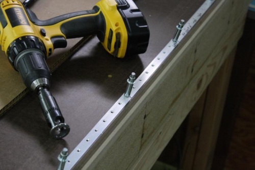 Used 3 edge bit in cage that worked better than singe cutting edge used on ailerons.