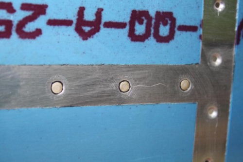 Rivets with Proseal visible.