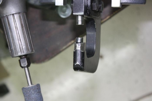 Mod to pneumatic squeezer jaw for clearance.