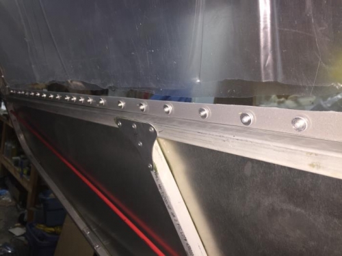 washers allow rivets to clamp window