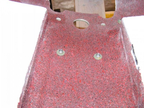 This is an interior vew of a couple of rivets for the reinforcing plate as the poke into the trough.