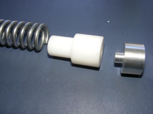 Lower Spring Centering Plug and Lower Load Transfer Plug