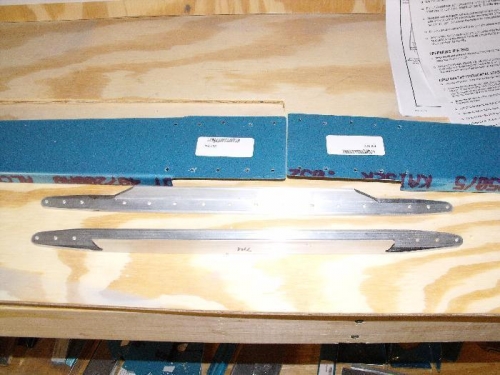 Reinforcement bars shaped, match drilled to trimmed spar channels