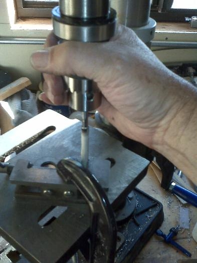 Hand tapping with press