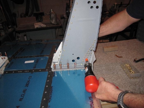 Riveting the WD-822 L & R box weldments