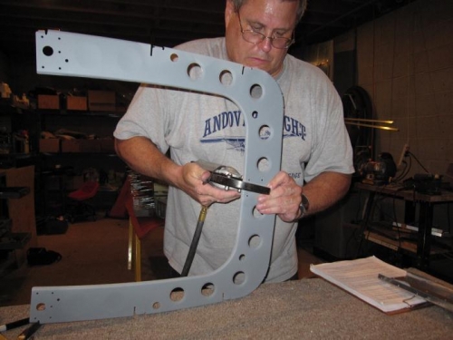 Riveting the F-808L and R bulkheads together
