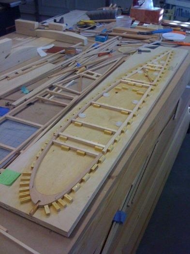 Rib 11 outer wing panel capstrips in jig