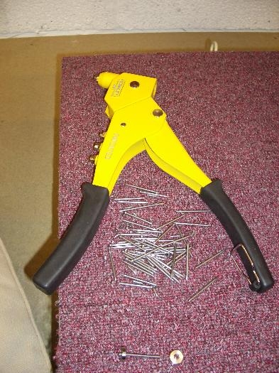 Remains of nails used in pop rivet dimpler